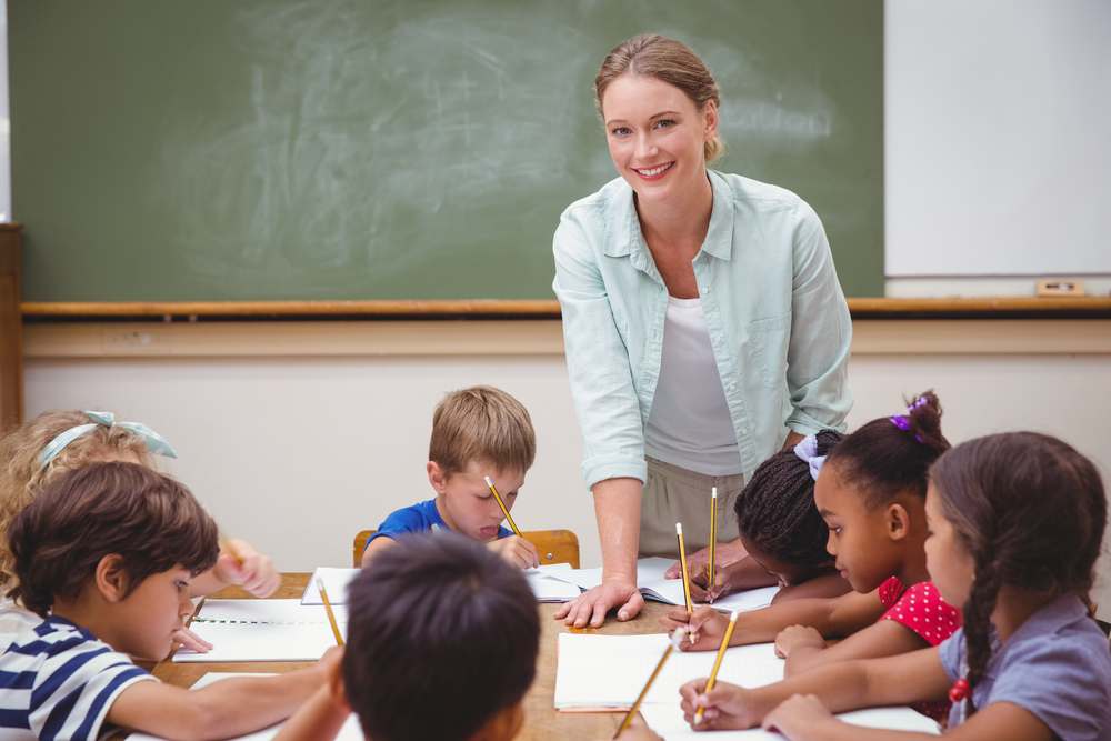 Female teacher who used language training to become bilingual with her young students